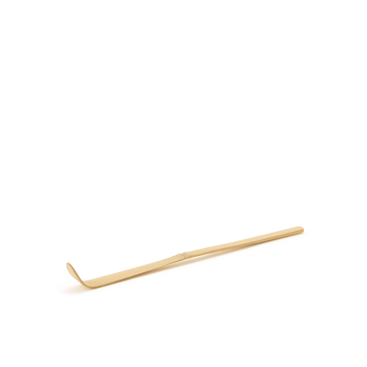 A Bamboo Matcha Spoon, with elegant simplicity reminiscent of Japanese tea ceremony utensils, is placed on a plain white background.