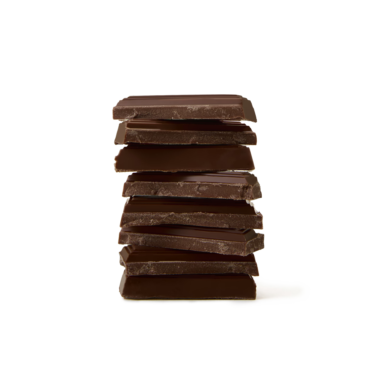 A stack of unevenly broken Dark Chocolate Bar pieces is arranged on a white background.