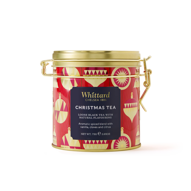 A festive red and gold Christmas Tea Clip Top Tin decorated with hanging ornament designs. This 750g tin features a gold lid and clasp, and is filled with aromatic loose black tea infused with vanilla, cloves, and citrus.