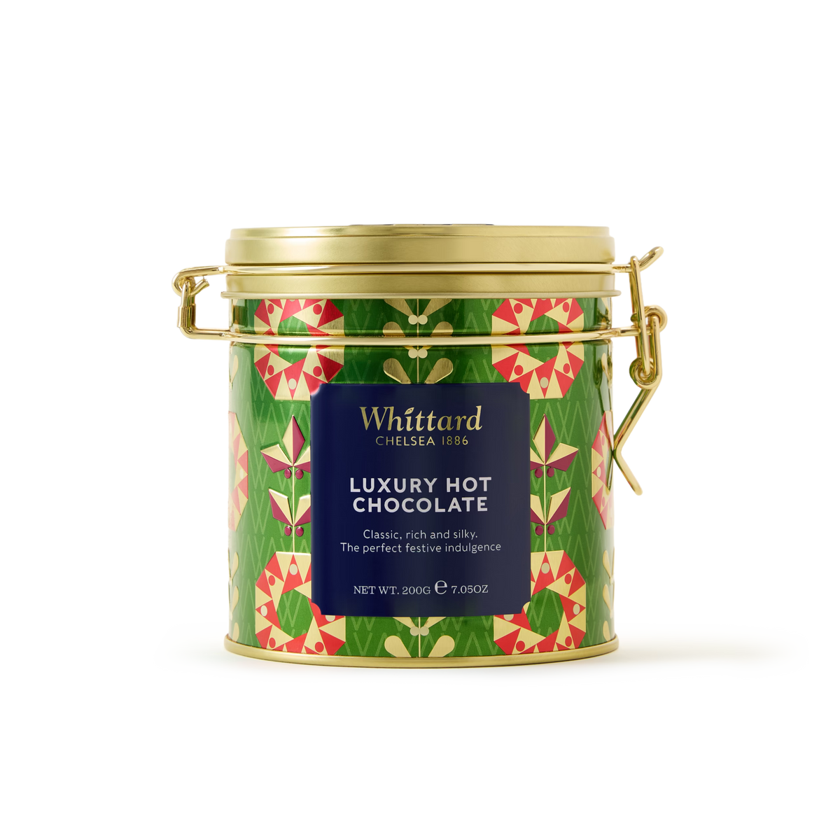 A festive tin of Whittard Luxury Hot Chocolate with a gold lid, green and red floral design, and a blue label displaying the product name and description.