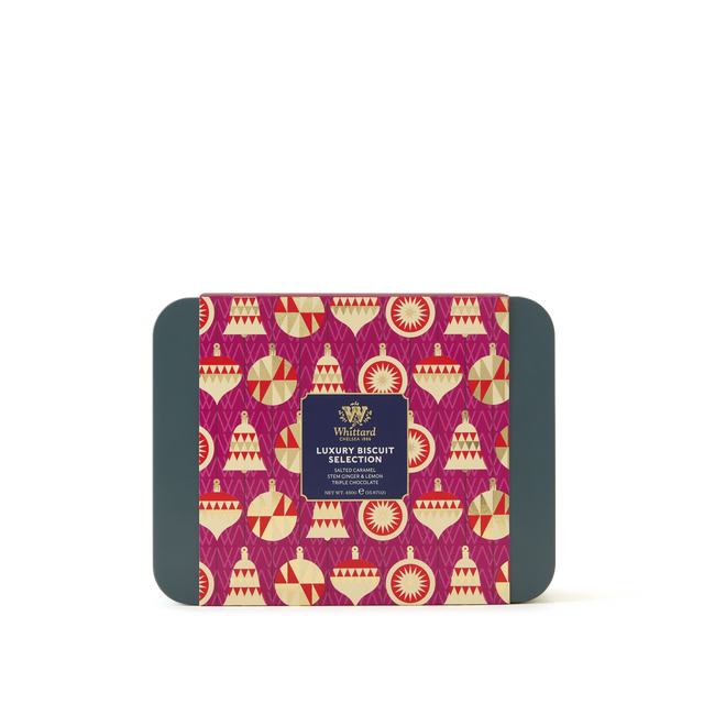 A rectangular Biscuit Selection Tin featuring a festive red, gold, and cream geometric pattern on the lid and sides, finished with a navy label in the center—an irresistible Christmas gift tin that makes the perfect festive biscuit collection for sharing or gifting.