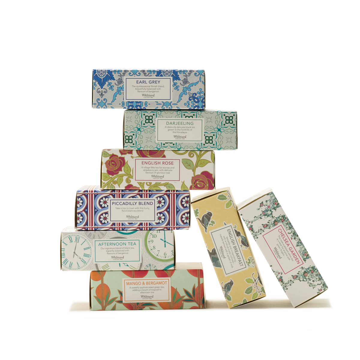 Stack of nine decorative tea boxes from Whittard’s "Tea Discoveries A Taste of Tea" collection, featuring various floral and patterned designs. Each box is labeled with a different tea flavor such as Earl Grey, Darjeeling, English Rose, and Mango & Bergamot. This beautifully arranged tea gift set presents an assortment of teas on a crisp white background.