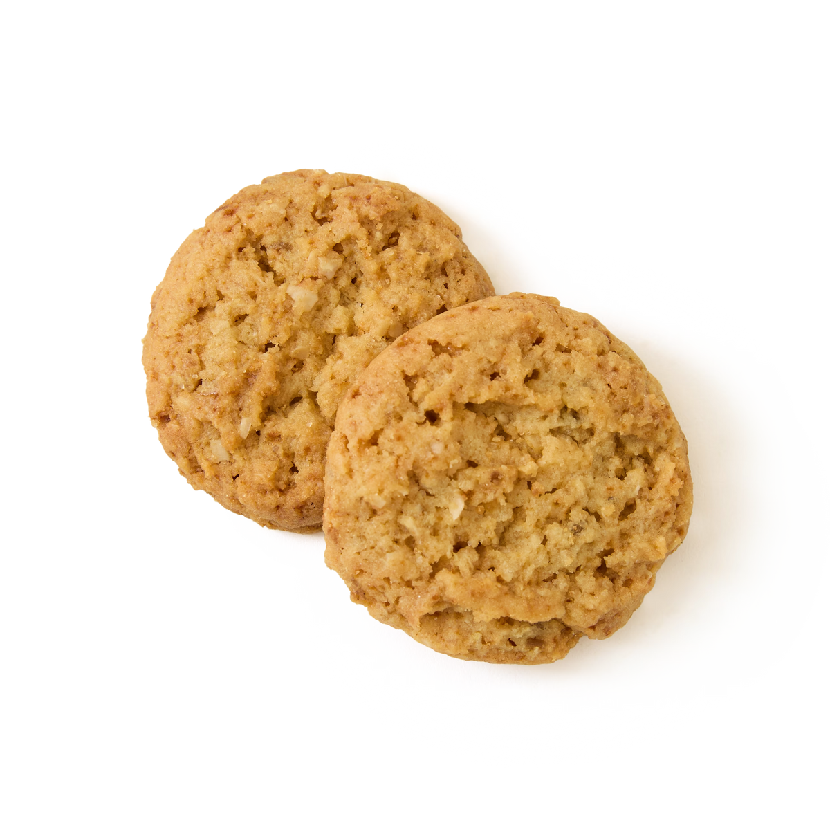 Two round Rhubarb and Custard Biscuits with a golden-brown color are placed on a white background, slightly overlapping each other—reminiscent of classic British biscuits and evoking the comforting nostalgia of treats enjoyed with afternoon tea.