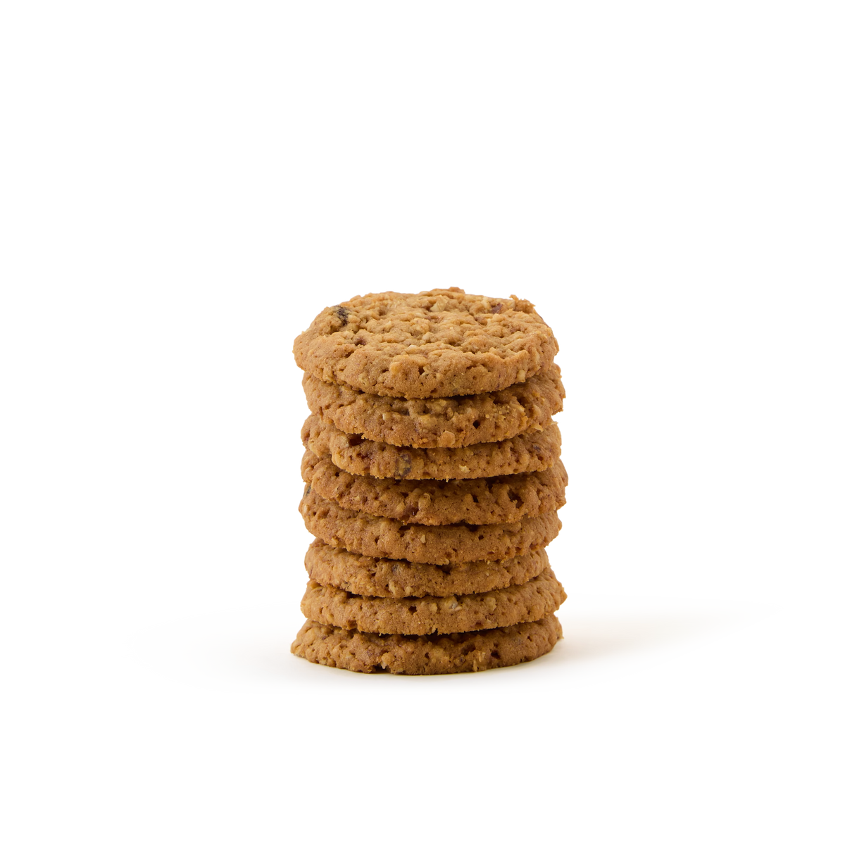 A stack of seven oatmeal cookies is arranged neatly on a white background.