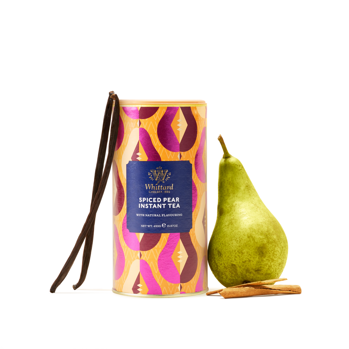 A colorful tin labeled Spiced Pear Flavour Instant Tea stands next to a fresh green pear, cinnamon sticks, and two vanilla pods on a white background, capturing the essence of a cozy autumn flavour.