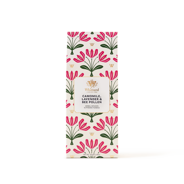A floral-patterned box of Camomile, Lavender and Bee Pollen Pyramid Teabags features pink, green, and yellow flowers on a white background—perfect for enjoying a calming lavender infusion or soothing camomile tea that is naturally caffeine free.