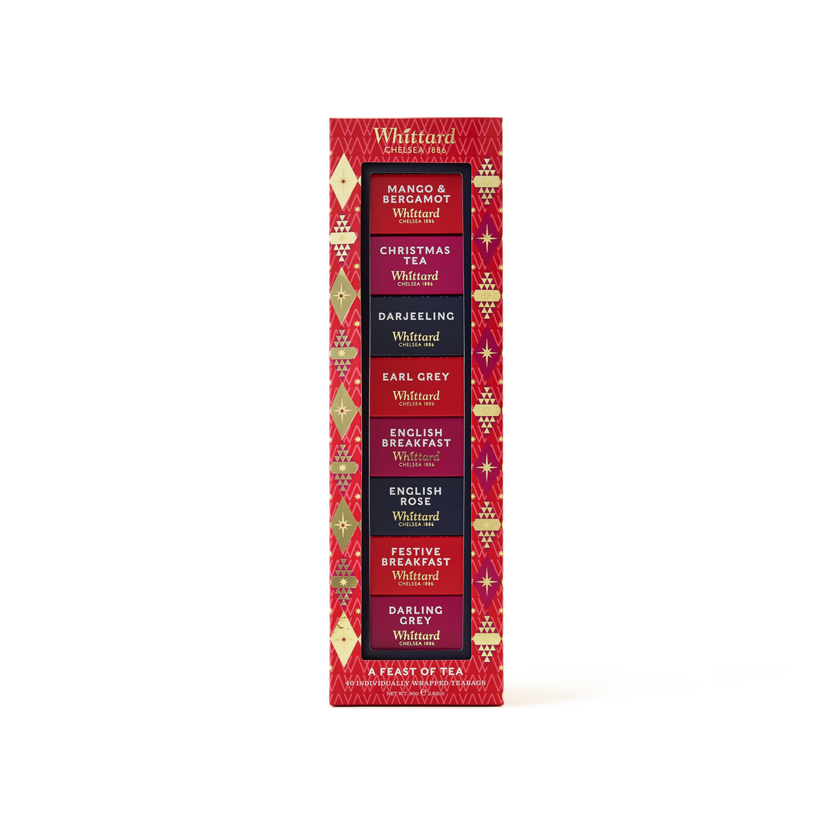 A festive red Whittard tea gift box featuring six flavors: Mango & Bergamot, Christmas, Darjeeling, Earl Grey, English Breakfast, and Festive Breakfast. Gold and purple holiday patterns decorate the packaging.