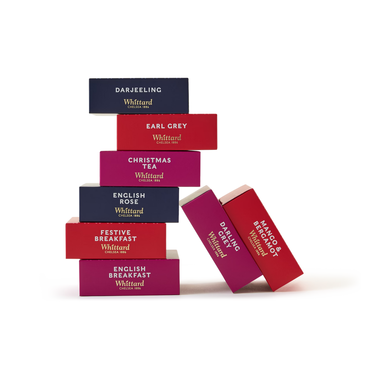 Stack of colorful Whittard tea boxes, including Darjeeling, Earl Grey, Christmas Tea, Festive Breakfast, English Rose, English Breakfast, Darling Grey, and Mango & Bergamot, arranged in a staggered pile.