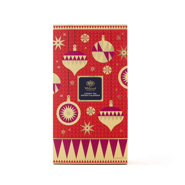 A festive red and gold box featuring ornament and star designs, labeled “Tea Advent Calendar” in the center. The background showcases geometric patterns and decorative details.