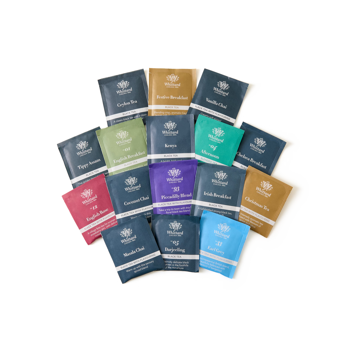 A fanned-out assortment of 15 individually wrapped tea bags from the Tea Advent Calendar, each in a different color and labeled with a unique tea blend name, arranged on a white background.