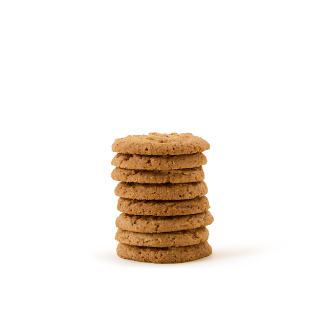 A stack of eight Cranberry & White Chocolate Biscuits is neatly arranged on a white background, showcasing these festive treats that are perfect for any occasion.