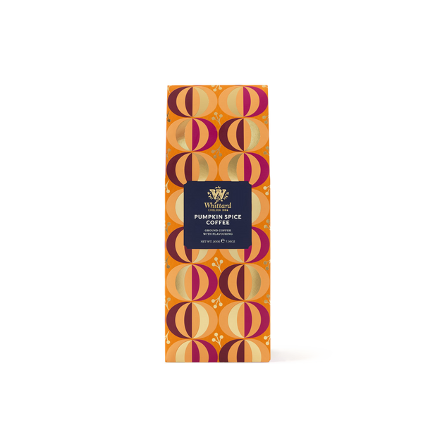 A bag of Limited Edition Pumpkin Spice Flavour Ground Coffee with an orange, brown, and pink geometric pattern, featuring the Whitford Reserve label in the center.