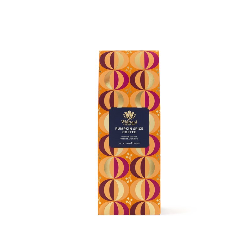 A bag of Limited Edition Pumpkin Spice Flavour Ground Coffee with an orange, brown, and pink geometric pattern, featuring the Whitford Reserve label in the center.