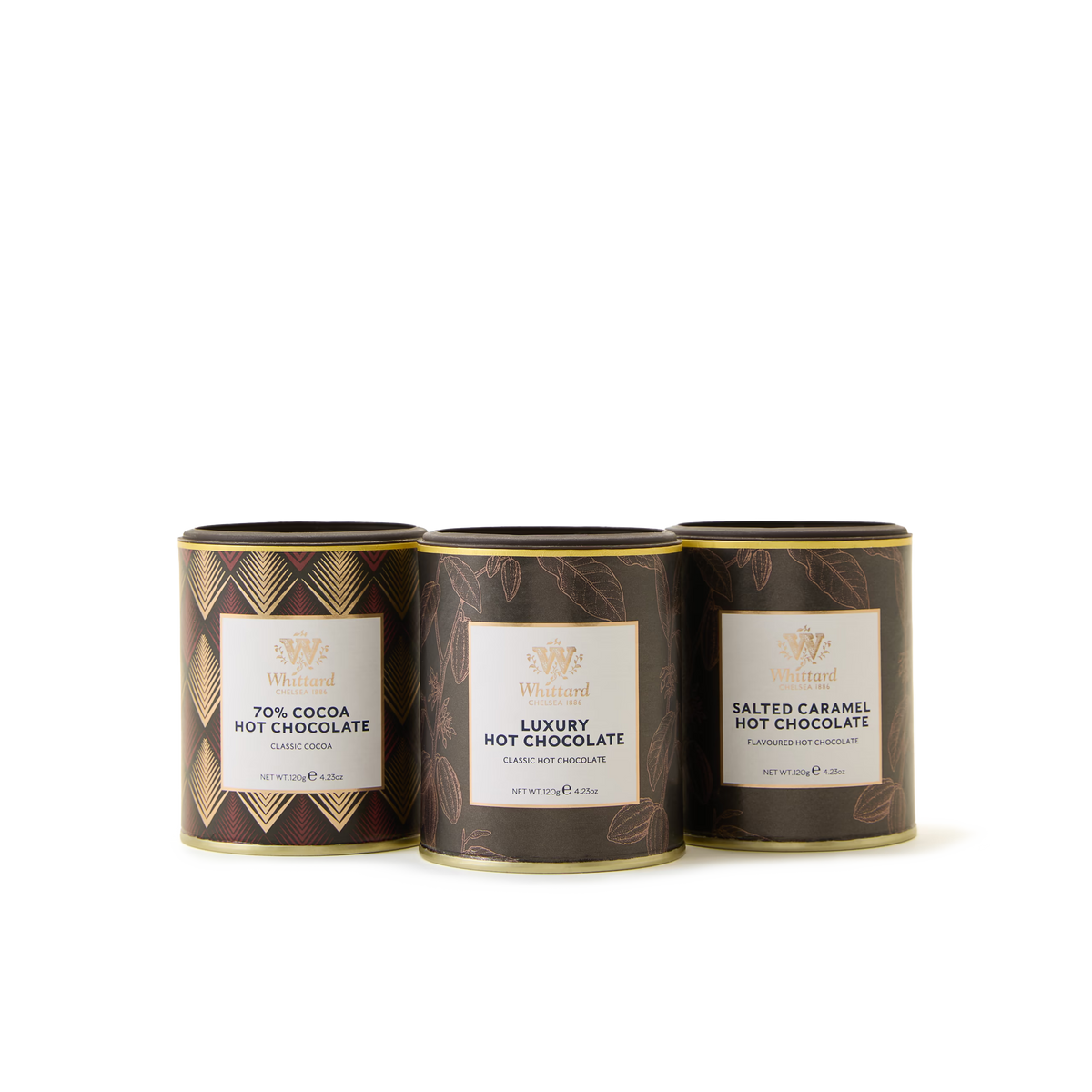 Three tins from the Hot Chocolate Classic Collection—70% Cocoa Hot Chocolate, Luxury Hot Chocolate, and Salted Caramel—are displayed side by side on a white background. Each tin features a distinct black and gold pattern.