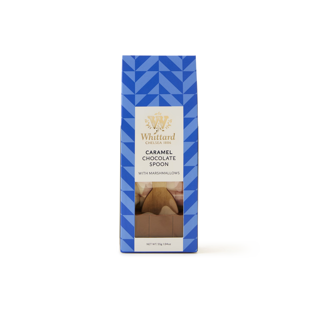 A blue, geometric-patterned box of Caramel Flavour Milk Chocolate Spoon with Marshmallows, ideal for making rich caramel hot chocolate, features a clear front window displaying the chocolate pieces and marshmallows inside.