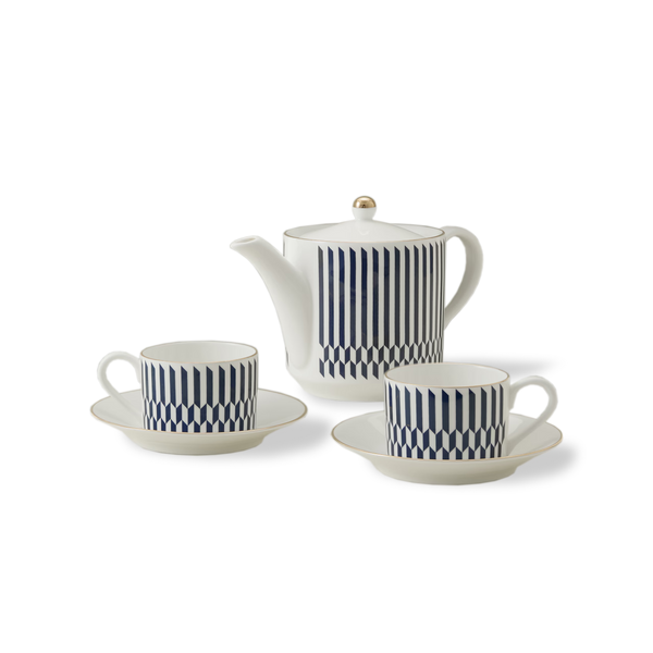 The Chelsea Collection Sloane Tea Set features a white porcelain teapot with a gold-tipped lid, accompanied by two matching teacups and saucers. Each piece is adorned with vertical navy blue stripes and finished with 22ct gold detailing. This elegant afternoon tea set, exemplifying British ceramic craftsmanship, is showcased against a plain white background.