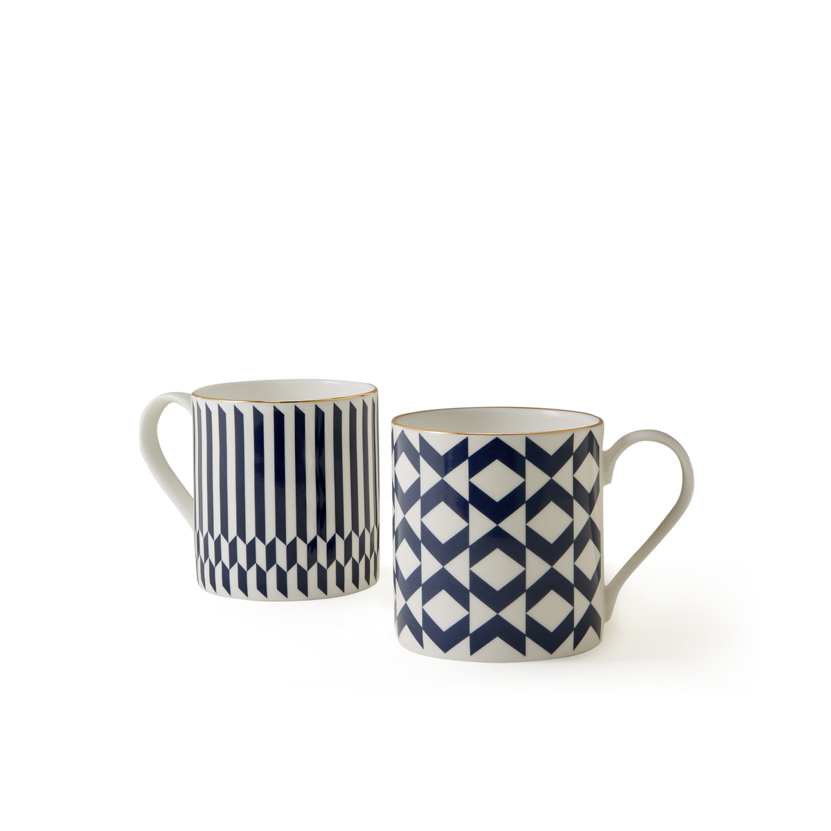 The Chelsea Collection Mug Duo features two white ceramic mugs with blue geometric patterns—one adorned with vertical stripes and hexagons, and the other displaying a repeating diamond and triangle design. Showcasing British craftsmanship, both mugs are equipped with handles and presented against a plain white background.