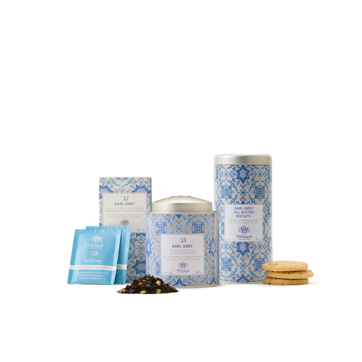The Earl Grey Collection—featuring blue floral-patterned tea tins, Earl Grey tea bags, loose leaf tea, and a tempting stack of cookies—is arranged against a white background, making it perfect for an indulgent afternoon tea or as an elegant gift set.