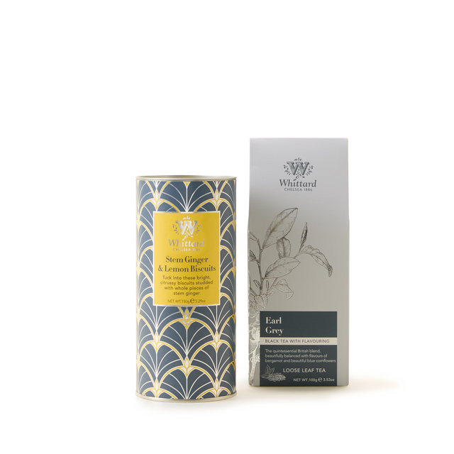 A cylindrical tin of Whittard Stem Ginger and Lemon Biscuits stands next to a box of Whittard Earl Grey Loose Tea, both arranged on a plain white background—the perfect pairing for a classic afternoon tea.