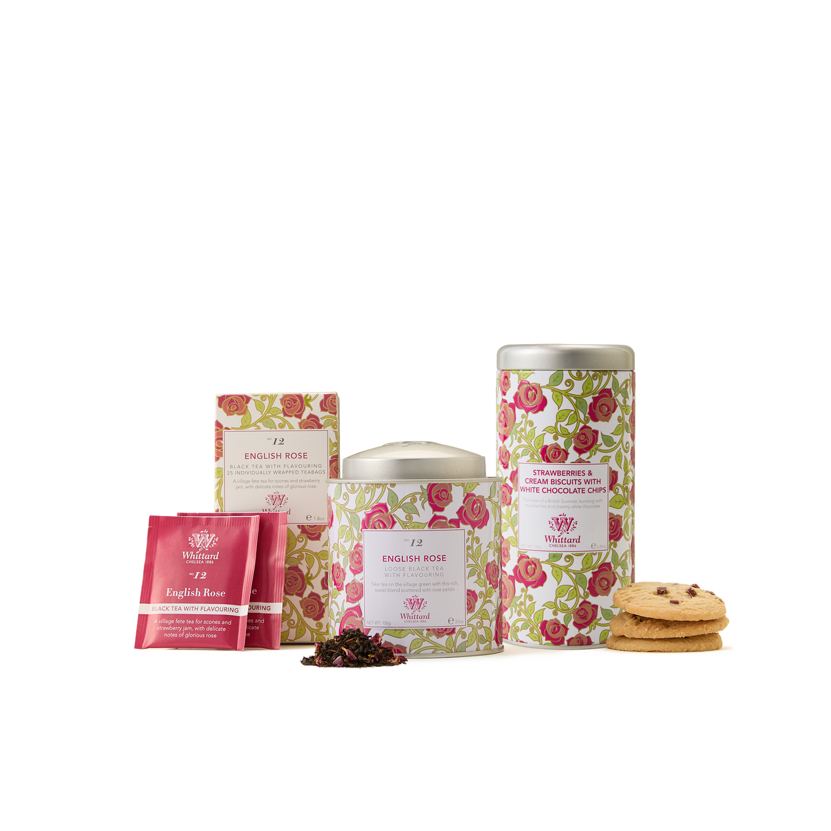 The English Rose Collection showcases a delightful assortment that includes floral-patterned tins, a box of English Rose tea, tea sachets, loose floral tea leaves, and two cookies stacked together—all beautifully displayed on a white background.
