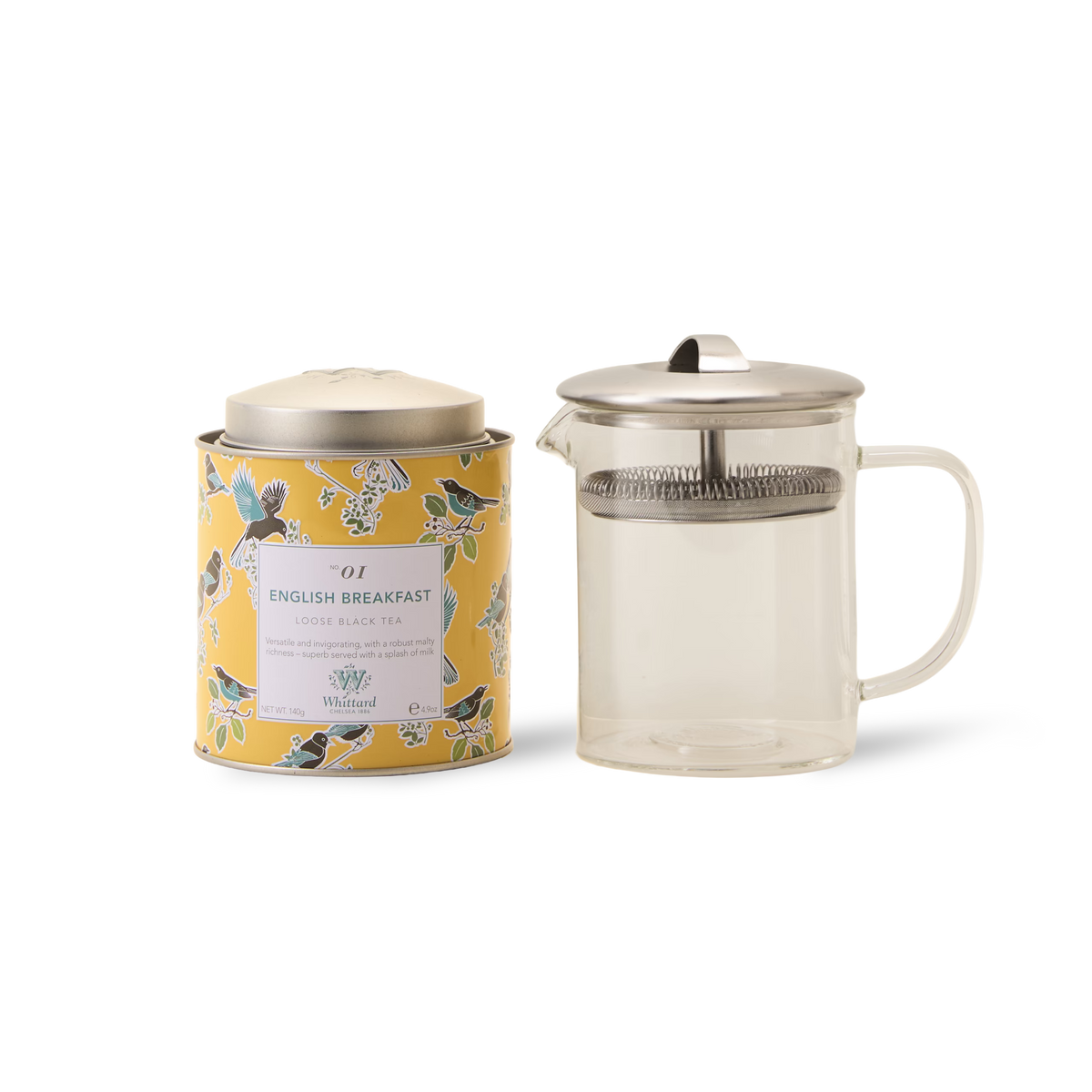 The Greenwich Tea Collection, featuring a tin of English Breakfast loose leaf tea in a floral yellow design and a clear Greenwich Teapot with a metal lid and built-in strainer, makes a lovely personalised tea gift for any occasion.