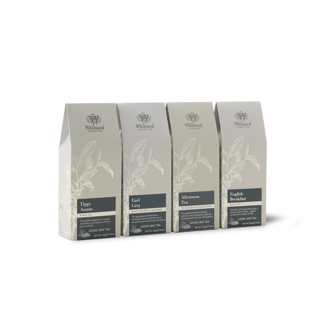 Four boxes of Whittard loose leaf tea—Tippy Assam, Earl Grey, Afternoon Tea, and English Breakfast—are beautifully arranged in light grey packaging with botanical illustrations and dark labels. Perfect for black tea enthusiasts or anyone seeking to elevate their teatime experience, The Time for Tea Subscription offers a delightful and convenient way to enjoy premium teas delivered right to your door.