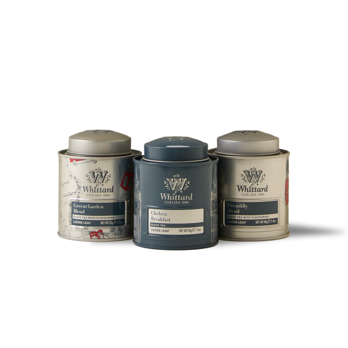 Three tins of Whittard loose leaf teas—General Garden, Chelsea Breakfast, and Piccadilly—are arranged side by side on a white background, creating The British Icons Mini Caddy Gift Box: a charming collectible trio and an ideal British tea gift set.